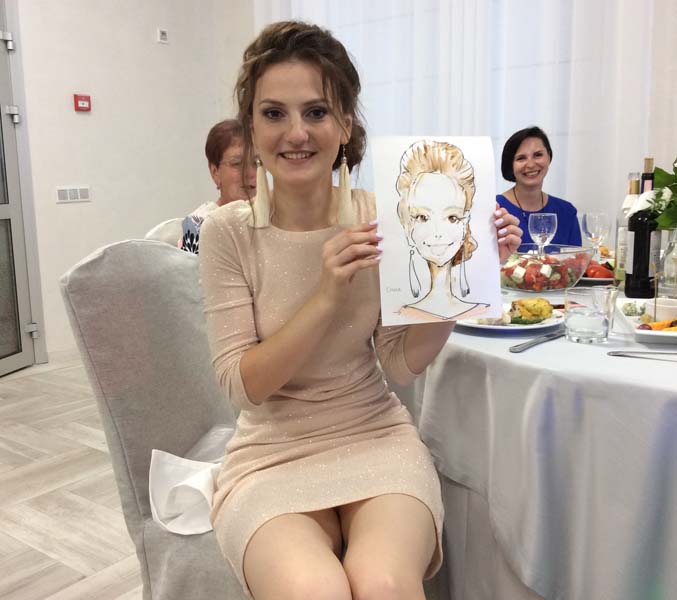Ольга позирует художнику в ресторане 