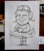 Изображение летчика на детском самолете шаржист Михаил Шабалин, шаржист Мишель