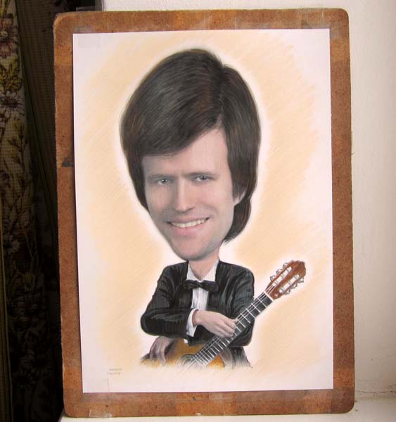 Пастельный рисунок гитариста с бабочкой Шаржист Михаил Шабалин, шаржист Мишель